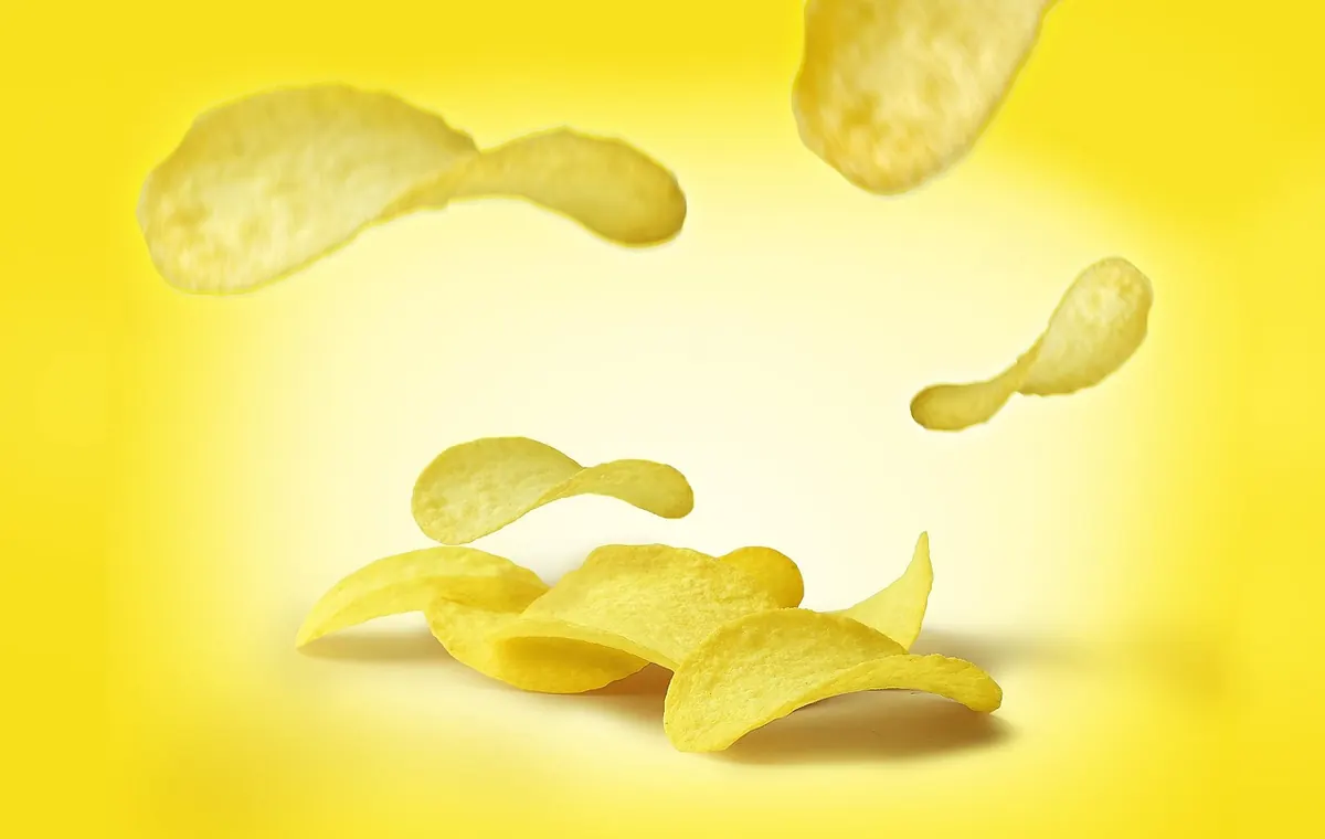 A Beginner's Guide to British Chip Shop Menu Terms: Scraps, Spam Fritters, and More